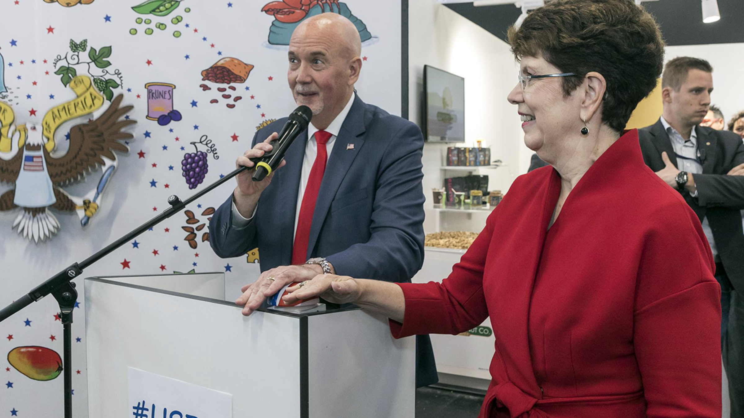 FAS Administrator Ken Isley and U.S. Chargé d’Affairs Robin Quinville welcome exhibitors and buyers at the opening of the USA Pavilion at the 2019 Anuga trade show in Cologne, Germany.