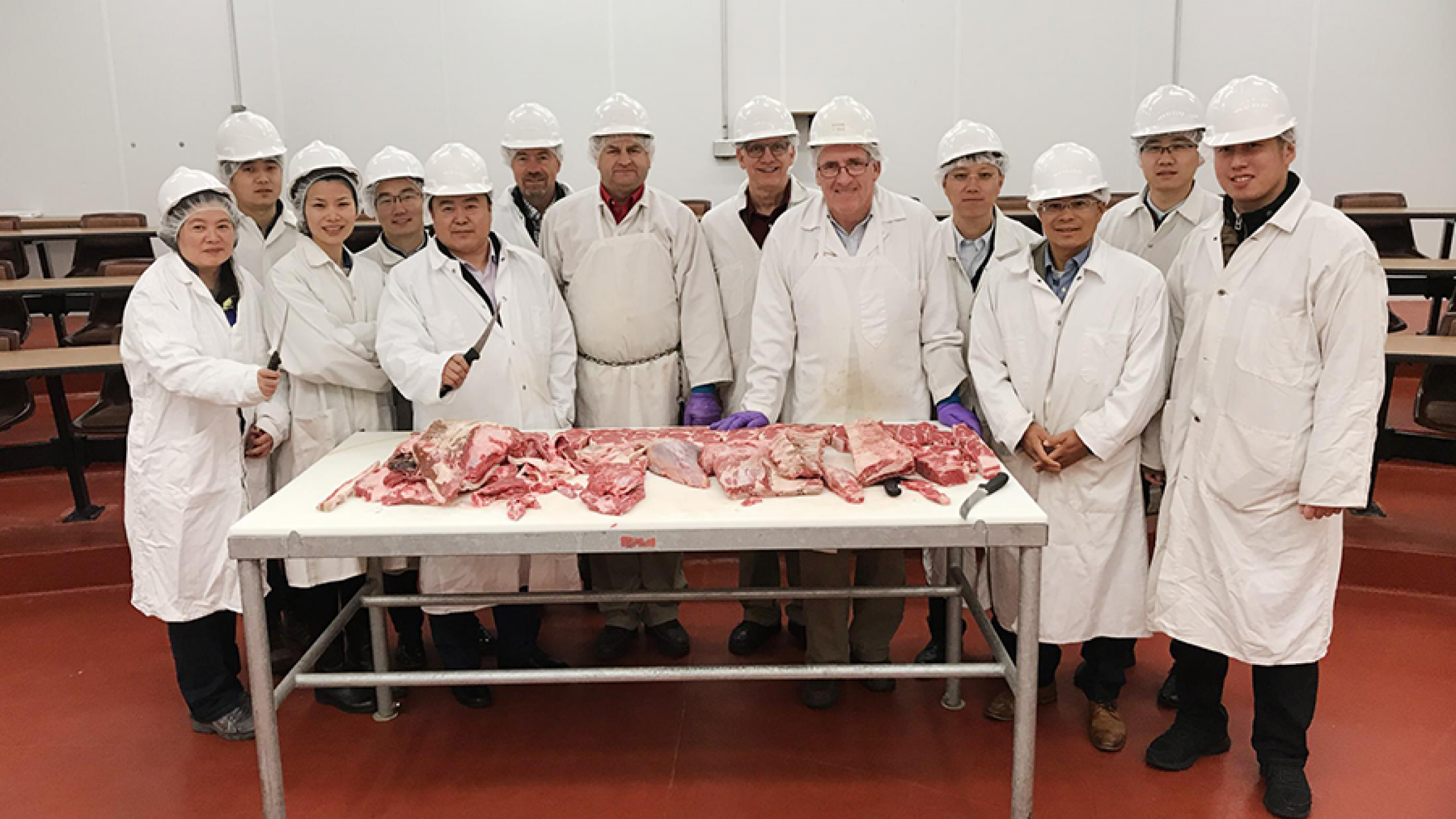 Chinese Cochran Fellows learning about beef processing at the University of Nebraska.