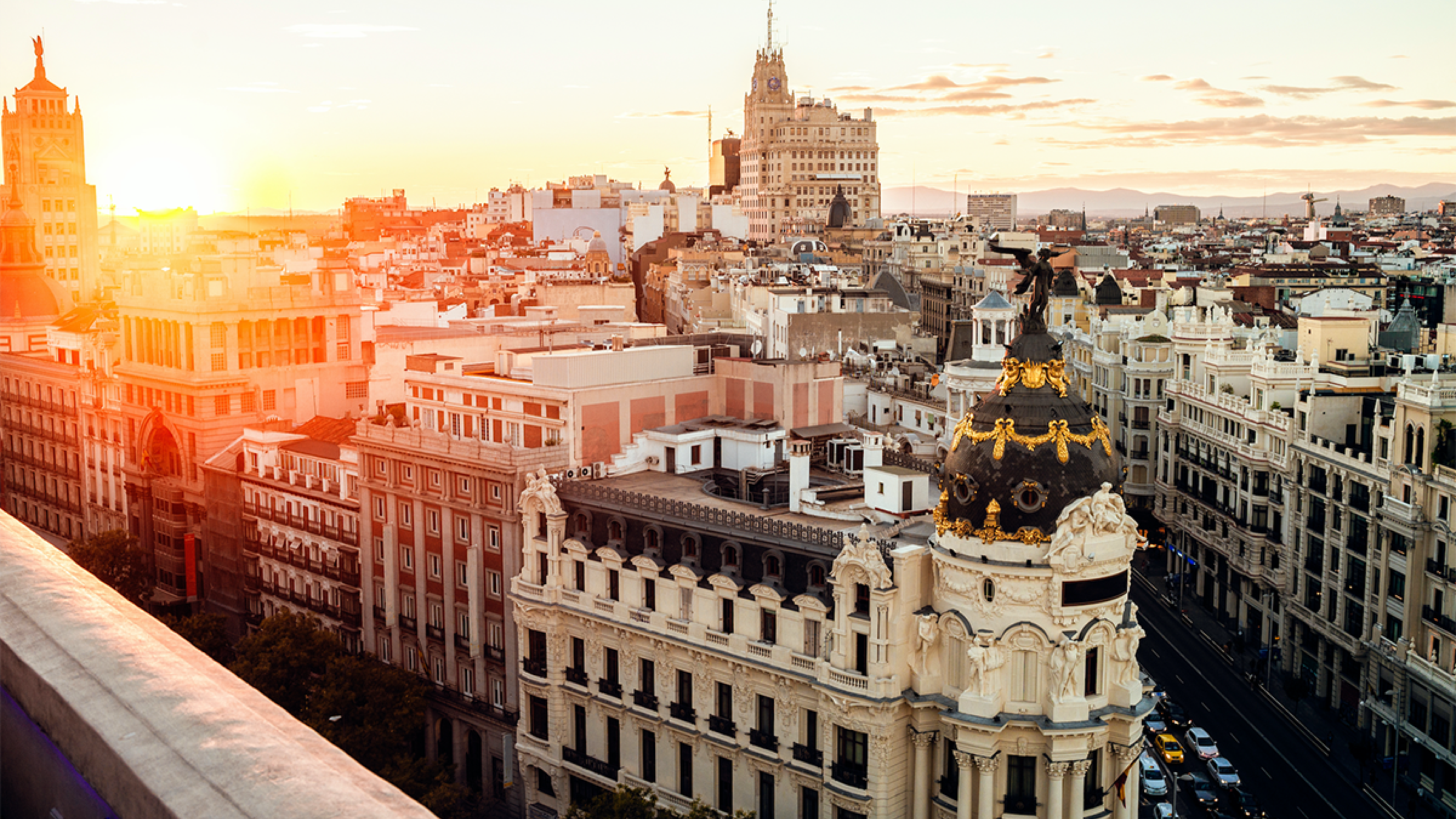 A photo of the historical city center of Madrid at sunset