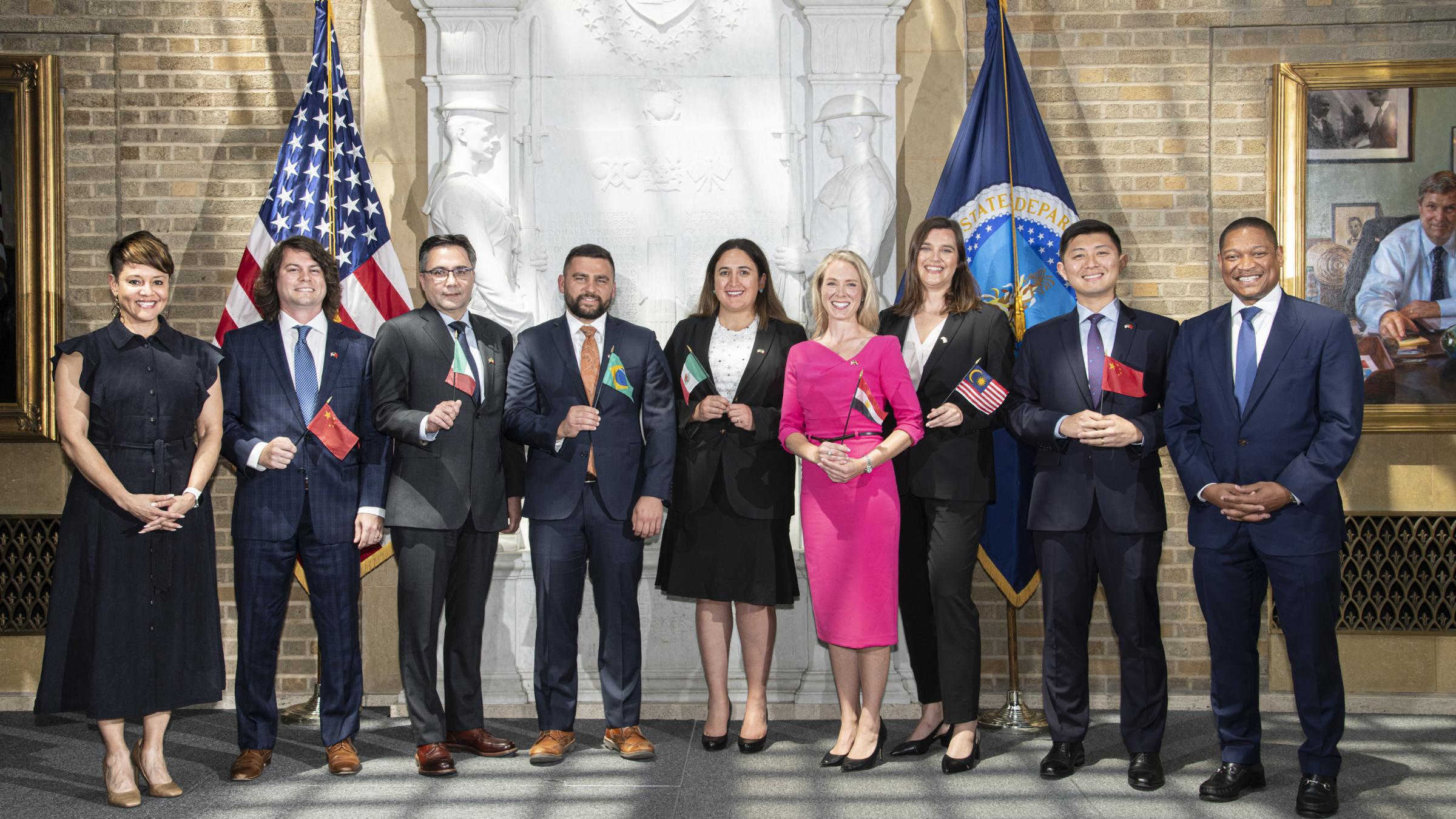 USDA Deputy Secretary Dr. Jewel Bronaugh and FAS Administrator Daniel Whitley with seven of the newest agricultural officers sworn into the Foreign Service at USDA Headquarters in Washington, D.C.