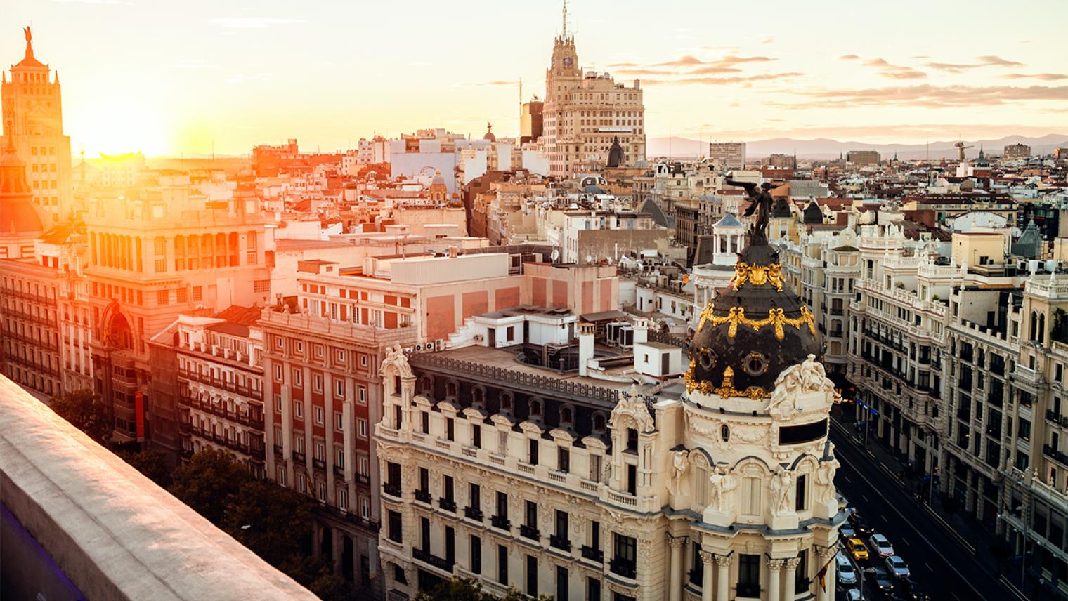A photo of the historical city center of Madrid at sunset