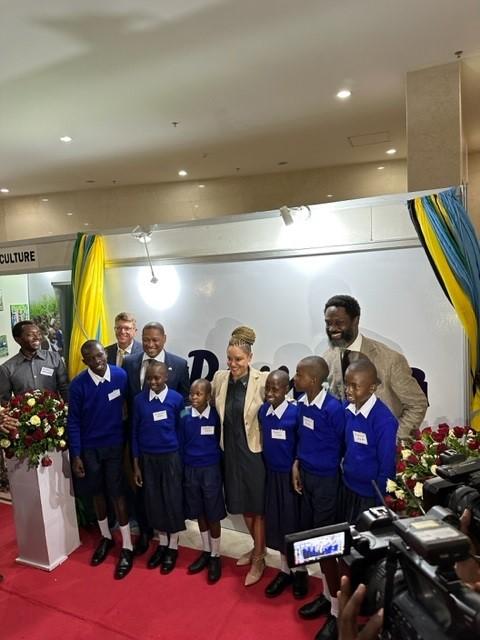 Deputy Secretary Dr. Jewel Bronaugh with schoolchildren from Mara at the relaunch of the McGovern-Dole Program in Tanzania.