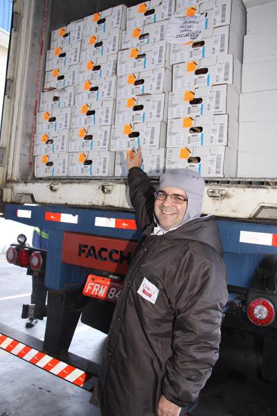 Consul General Ricardo Zuniga with the boxes of U.S. beef as they clear customs in Brazil, ready to hit the market. Consul General Ricardo Zuniga with the boxes of U.S. beef as they clear customs in Brazil, ready to hit the market.